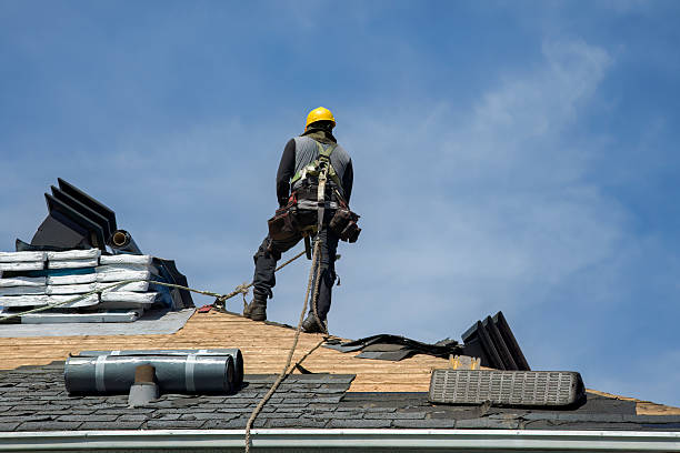 Professional Roofing technician working in Fields, OR